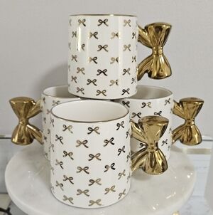 Elegant White and Gold Bow Handle Ceramic Mug - Brand Unknown Set Of Four.